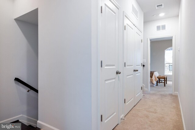 501 Triggerfish Dr, Oxon Hill, MD 20745 - hallway featuring an upstairs landing, baseboards, light colored carpet, and recessed lighting