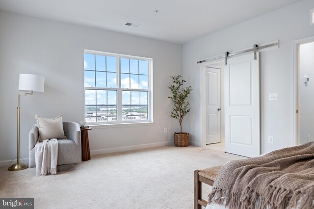 501 Triggerfish Dr, Oxon Hill, MD 20745 - carpeted bedroom featuring baseboards and a barn door