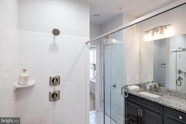 501 Triggerfish Dr, Oxon Hill, MD 20745 - full bath featuring a shower stall, vanity, and tile patterned flooring