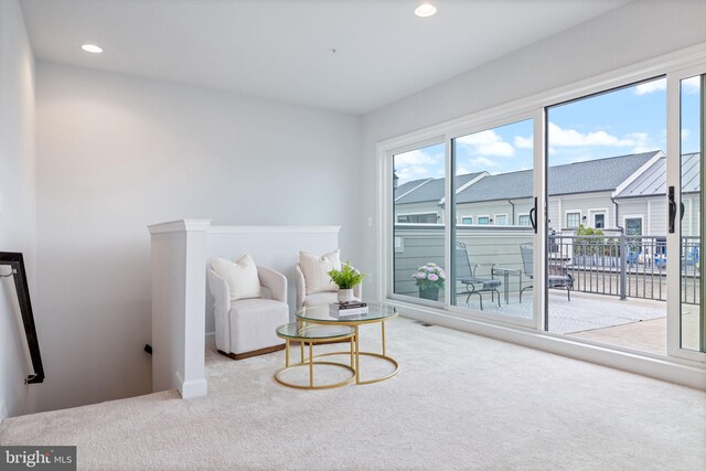 501 Triggerfish Dr, Oxon Hill, MD 20745 - living area featuring carpet floors, an upstairs landing, and recessed lighting
