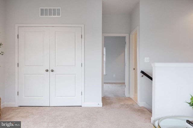 501 Triggerfish Dr, Oxon Hill, MD 20745 - unfurnished bedroom featuring carpet floors, a closet, and baseboards