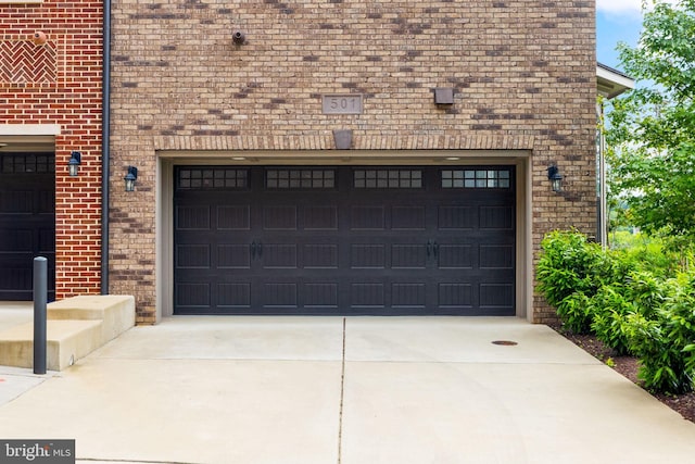 501 Triggerfish Dr, Oxon Hill, MD 20745 - garage featuring concrete driveway