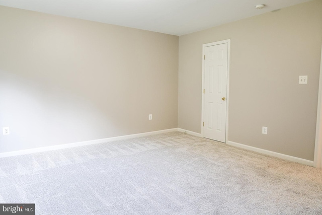 720 Beehive Way, Winchester, VA 22601 - empty room with light carpet, baseboards, and a smoke detector