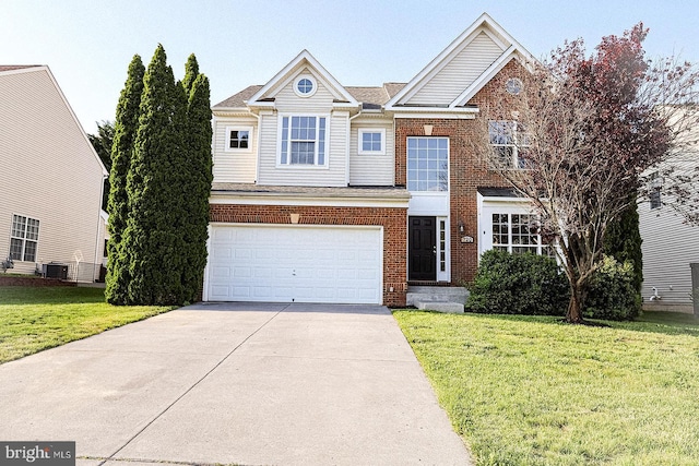 720 Beehive Way, Winchester, VA 22601 - view of front of house featuring a front yard, an attached garage, driveway, and brick siding