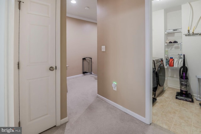 7269 Elkridge Crossing Way, Elkridge, MD 21075 - corridor with baseboards, washer and dryer, light colored carpet, and crown molding