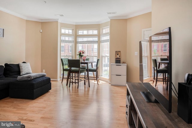 7269 Elkridge Crossing Way, Elkridge, MD 21075 - living room featuring light wood-style flooring, crown molding, and baseboards
