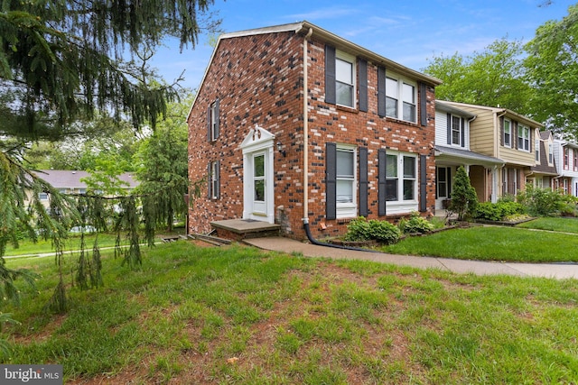 7 Woodland Ct, Hamilton, NJ 08610 - townhome / multi-family property with brick siding and a front yard