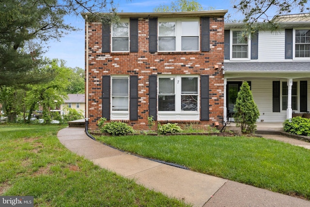 7 Woodland Ct, Hamilton, NJ 08610 - view of front of home featuring a front yard and brick siding