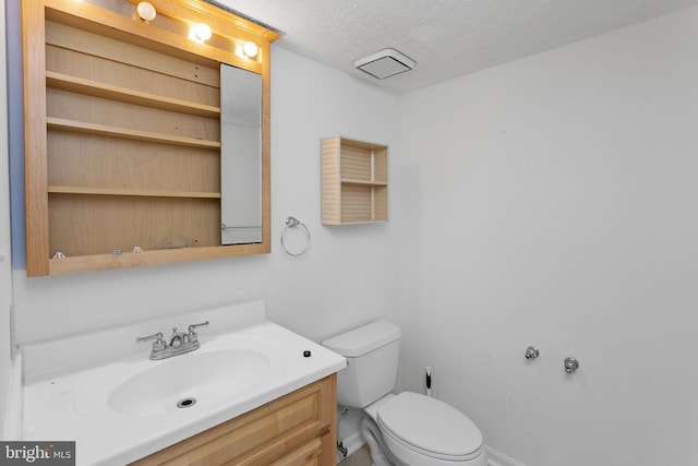 7 Woodland Ct, Hamilton, NJ 08610 - bathroom with toilet, vanity, a textured ceiling, and baseboards