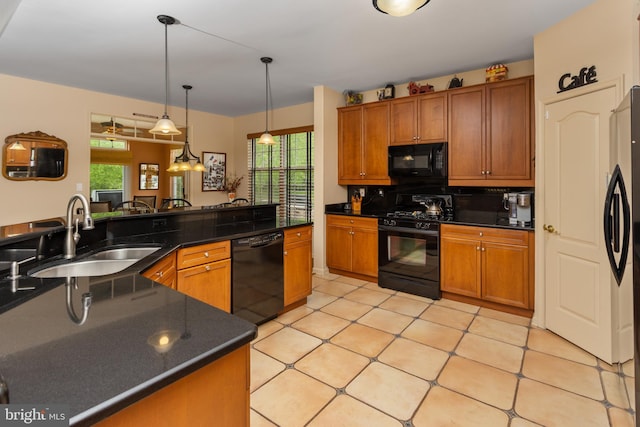 29 Monte Carlo Dr, Hamilton, NJ 08691 - kitchen featuring black appliances, a sink, brown cabinets, and plenty of natural light