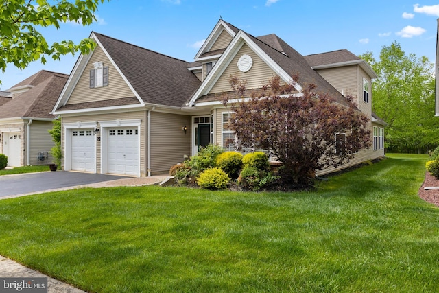 29 Monte Carlo Dr, Hamilton, NJ 08691 - traditional-style house with driveway, a front yard, and a shingled roof