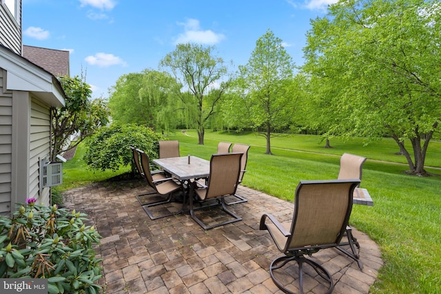 29 Monte Carlo Dr, Hamilton, NJ 08691 - view of patio with outdoor dining space and view of scattered trees