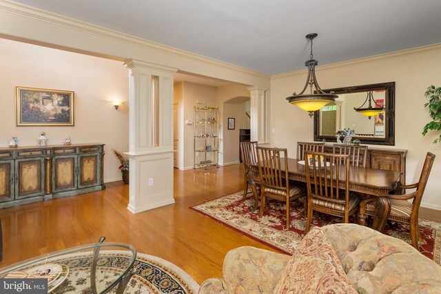 29 Monte Carlo Dr, Hamilton, NJ 08691 - dining room featuring ornate columns, wood finished floors, baseboards, and ornamental molding