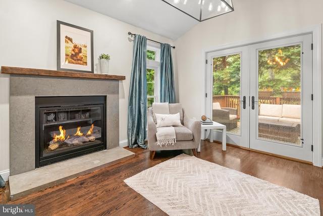 255 Lower Magothy Beach Rd, Severna Park, MD 21146 - sitting room with french doors, vaulted ceiling, a premium fireplace, and wood finished floors
