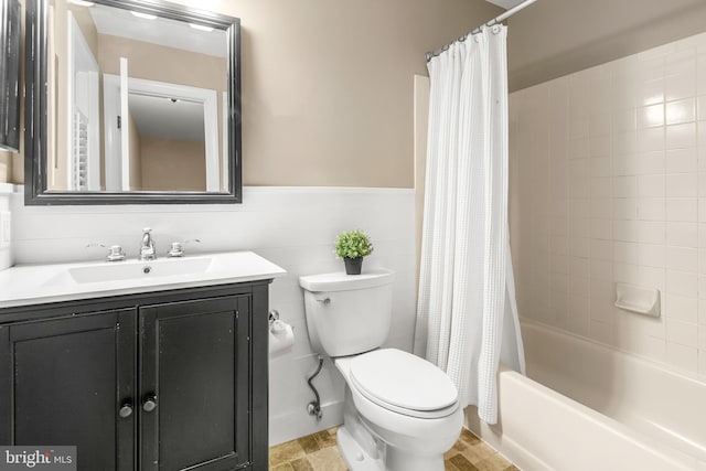 255 Lower Magothy Beach Rd, Severna Park, MD 21146 - bathroom with toilet, vanity, shower / bath combination with curtain, and a wainscoted wall