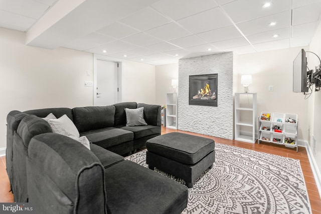 255 Lower Magothy Beach Rd, Severna Park, MD 21146 - living area featuring recessed lighting, wood finished floors, a large fireplace, a drop ceiling, and baseboards