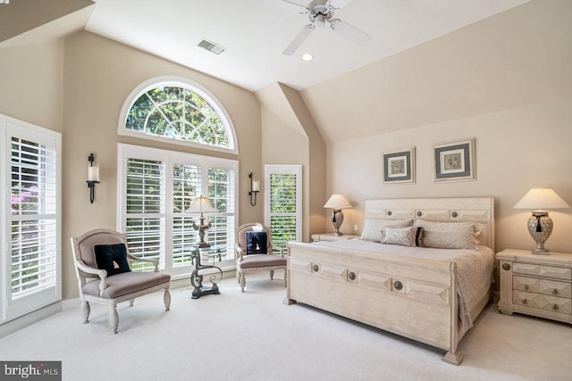 bedroom with carpet flooring, high vaulted ceiling, ceiling fan, and baseboards