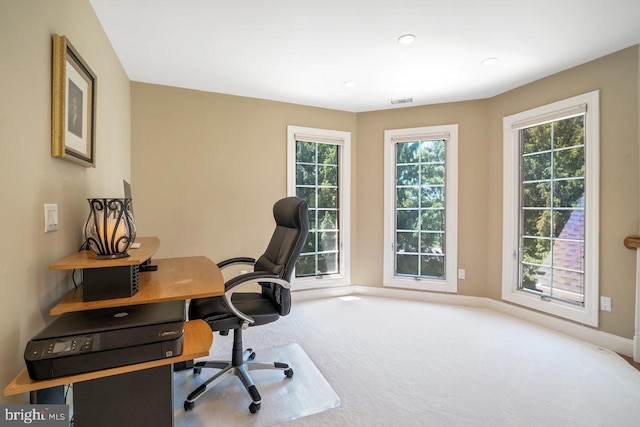 carpeted home office featuring plenty of natural light, baseboards, and recessed lighting