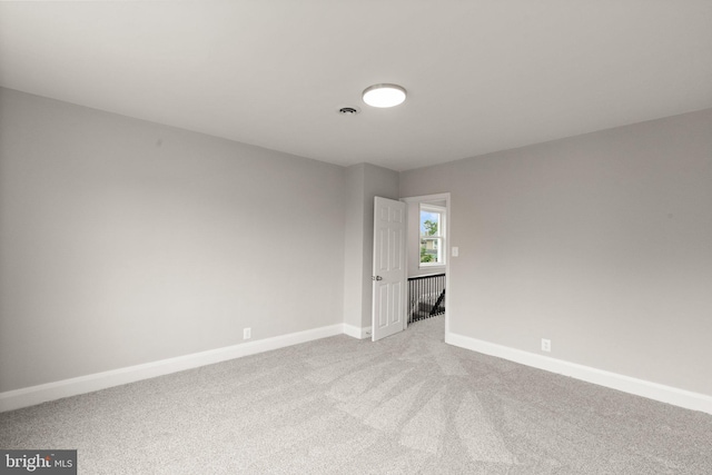 2811 Westfield Ave, Baltimore, MD 21214 - carpeted spare room featuring baseboards