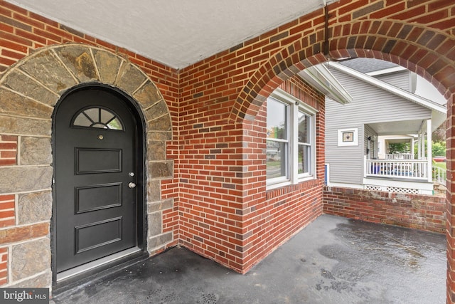 2811 Westfield Ave, Baltimore, MD 21214 - property entrance featuring brick siding and covered porch