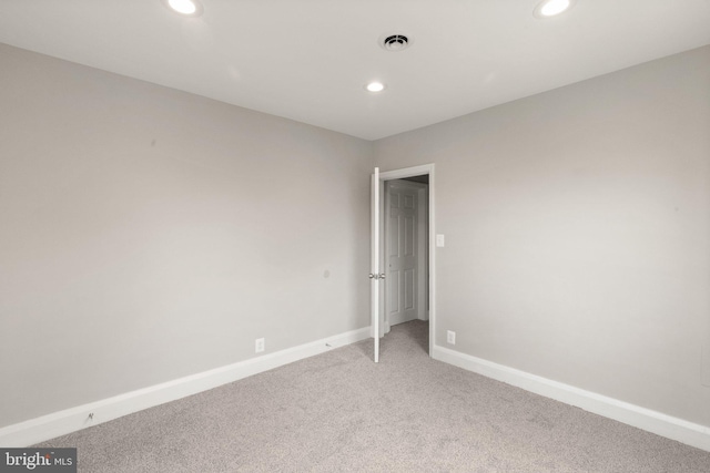 2811 Westfield Ave, Baltimore, MD 21214 - empty room with light carpet and recessed lighting