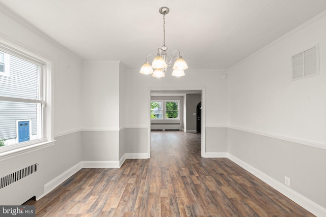 2811 Westfield Ave, Baltimore, MD 21214 - unfurnished room with radiator, wood finished floors, a chandelier, and ornamental molding
