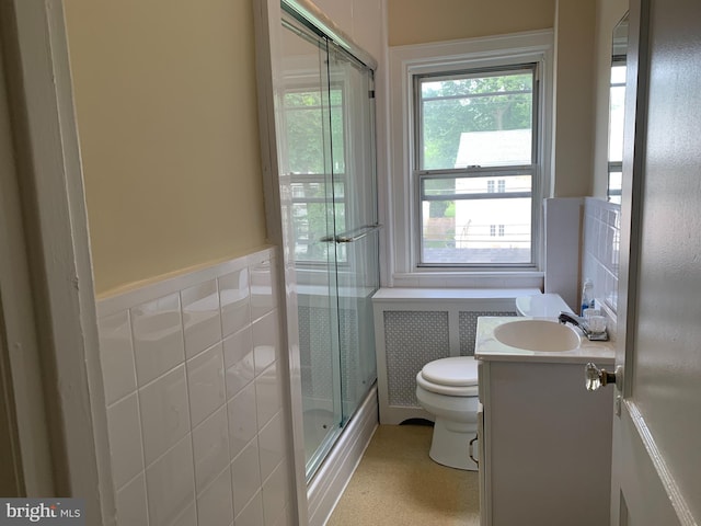 257 Williams Rd, Bryn Mawr, PA 19010 - full bath featuring toilet, vanity, combined bath / shower with glass door, and wainscoting