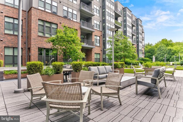 1761 Old Meadow Rd Unit 209, Mclean, VA 22102 - wooden deck featuring an outdoor hangout area