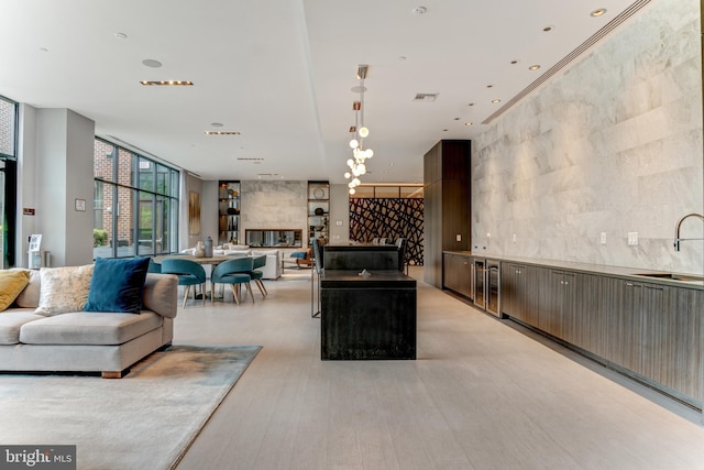 1761 Old Meadow Rd Unit 209, Mclean, VA 22102 - living room featuring floor to ceiling windows and light wood-style floors