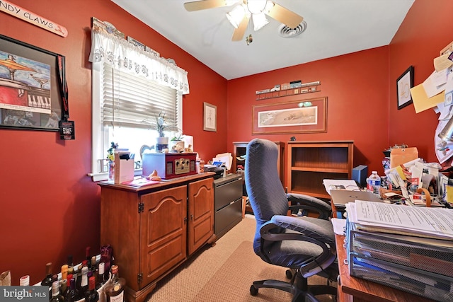 home office with ceiling fan and carpet flooring