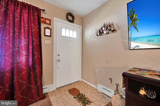 entryway featuring a baseboard heating unit