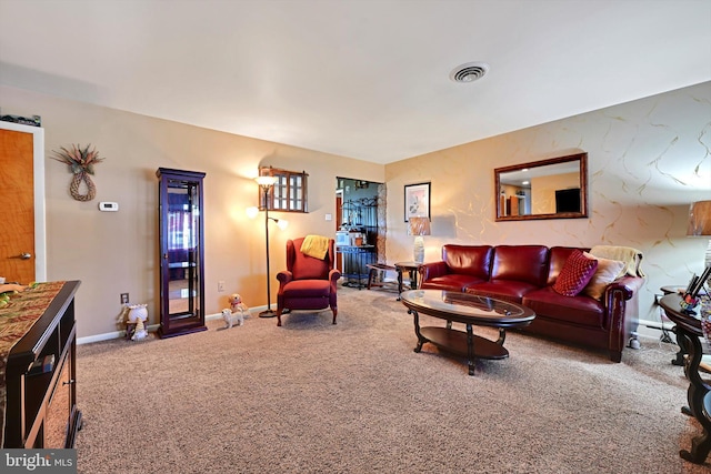 living area with carpet floors and baseboards
