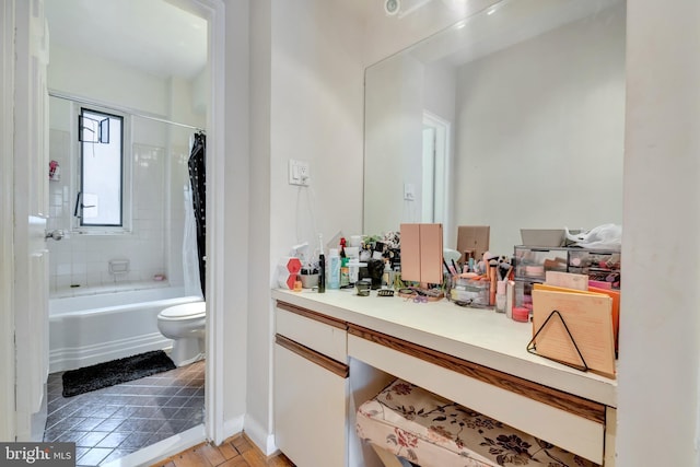 full bath with toilet, shower / tub combo, and vanity