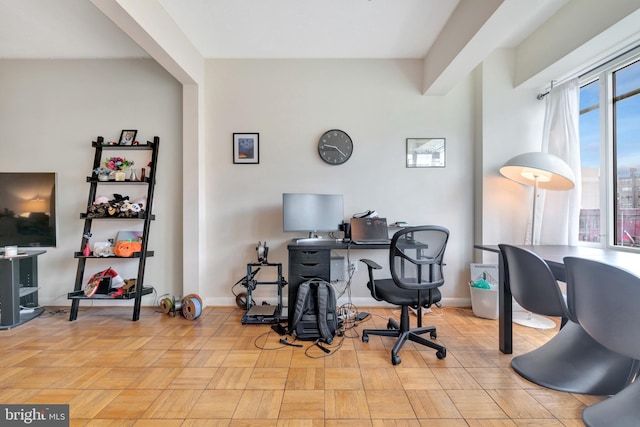 office area featuring baseboards