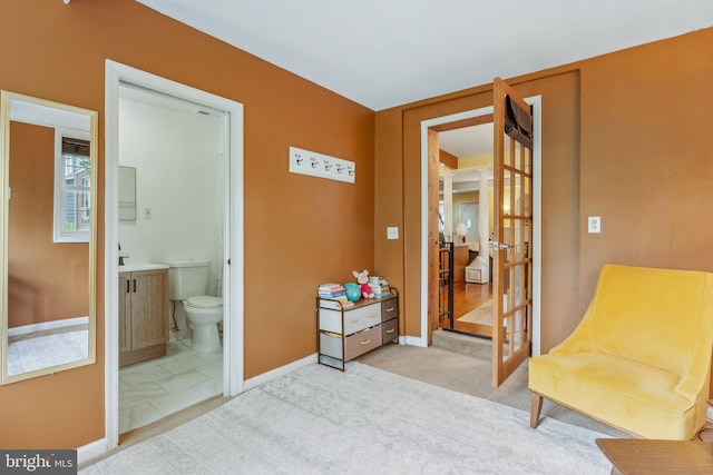5207 Eugene Ave, Baltimore, MD 21206 - sitting room with carpet floors and baseboards