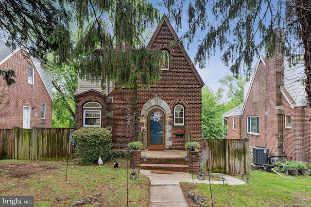 5207 Eugene Ave, Baltimore, MD 21206 - tudor house featuring brick siding and central air condition unit
