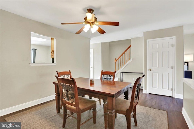 236 Nicole Way, Reading, PA 19608 - dining space featuring a ceiling fan, stairway, wood finished floors, and baseboards
