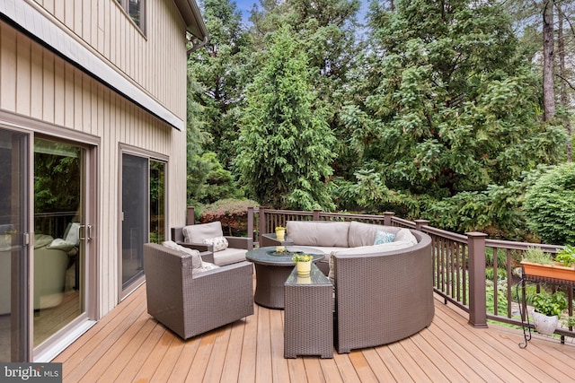 deck with an outdoor hangout area