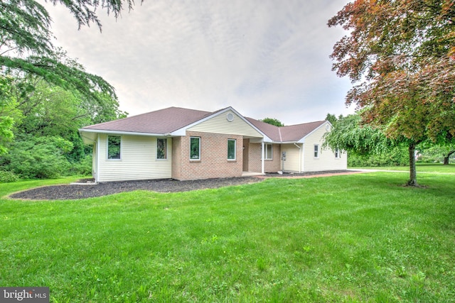 1017 Mill Rd, Leesport, PA 19533 - single story home with a front lawn and brick siding