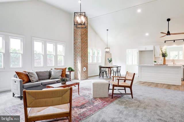 1017 Mill Rd, Leesport, PA 19533 - living area with high vaulted ceiling, a chandelier, healthy amount of natural light, ceiling fan, and baseboards