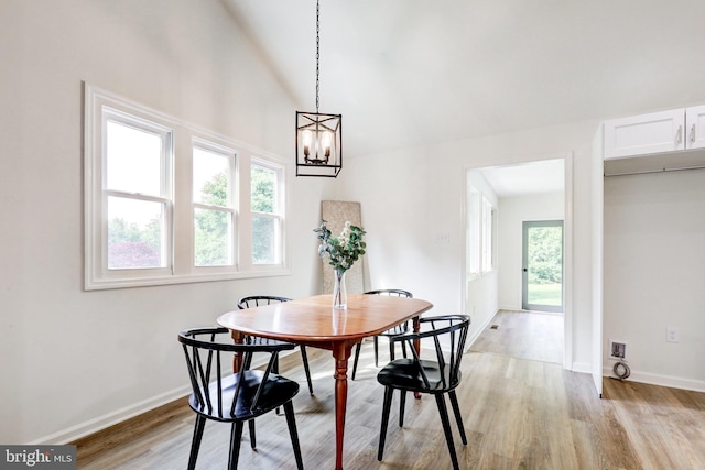 1017 Mill Rd, Leesport, PA 19533 - dining area with light wood-style flooring, baseboards, and a chandelier