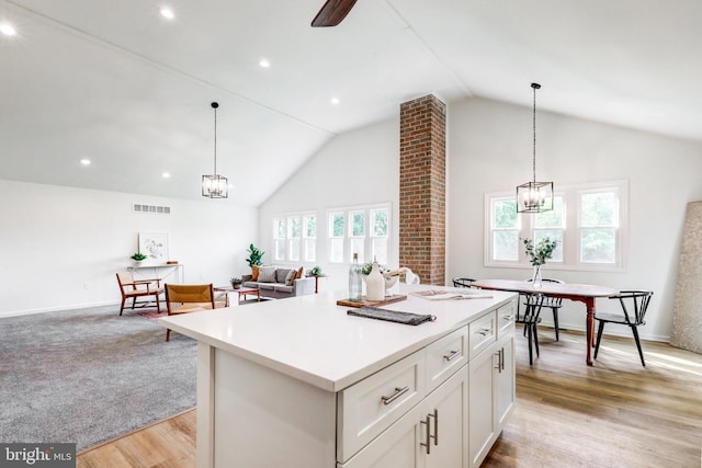 1017 Mill Rd, Leesport, PA 19533 - kitchen with a kitchen island, light wood finished floors, hanging light fixtures, open floor plan, and recessed lighting