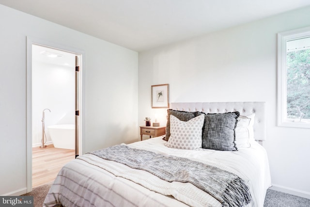 1017 Mill Rd, Leesport, PA 19533 - bedroom featuring baseboards, carpet flooring, and ensuite bath