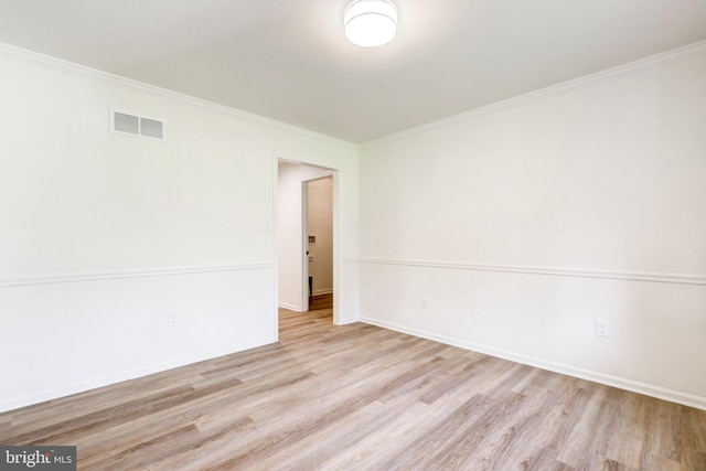 1017 Mill Rd, Leesport, PA 19533 - empty room featuring crown molding, wood finished floors, and baseboards