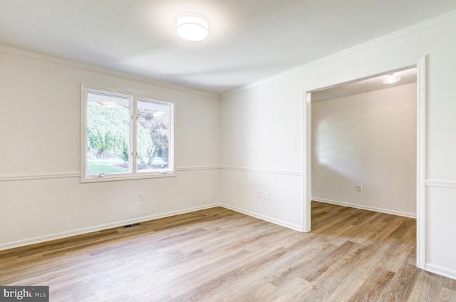 1017 Mill Rd, Leesport, PA 19533 - spare room with light wood-type flooring, crown molding, and baseboards