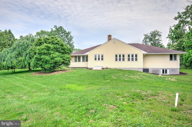 1017 Mill Rd, Leesport, PA 19533 - back of house with a chimney and a yard