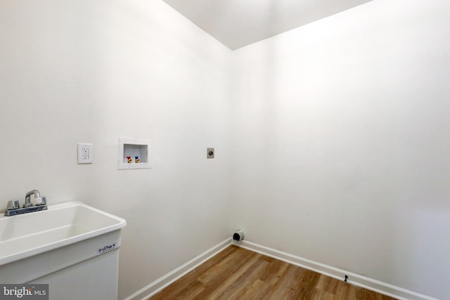1017 Mill Rd, Leesport, PA 19533 - washroom featuring light wood-style flooring, hookup for an electric dryer, hookup for a washing machine, and baseboards