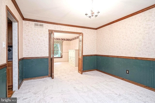 612 Howard Ave, Pitman, NJ 08071 - carpeted spare room featuring a wainscoted wall, a chandelier, wallpapered walls, and crown molding
