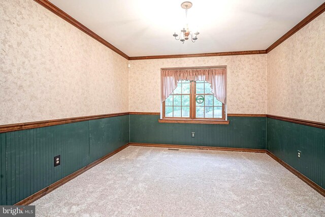 612 Howard Ave, Pitman, NJ 08071 - unfurnished room with wainscoting, a chandelier, carpet, crown molding, and wallpapered walls
