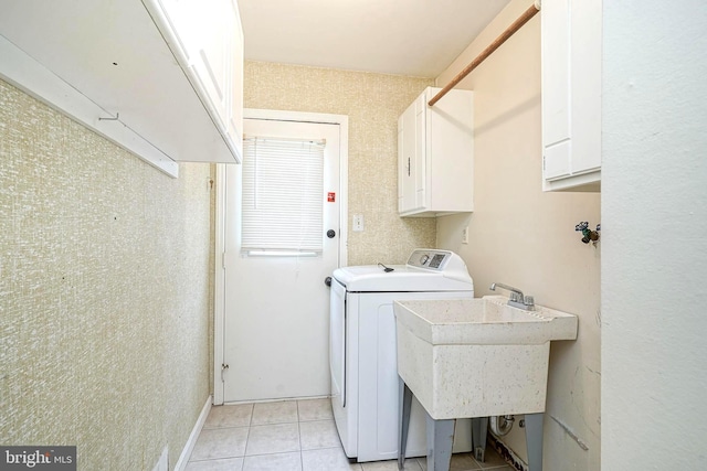 612 Howard Ave, Pitman, NJ 08071 - laundry area featuring washer / dryer, cabinet space, and light tile patterned floors